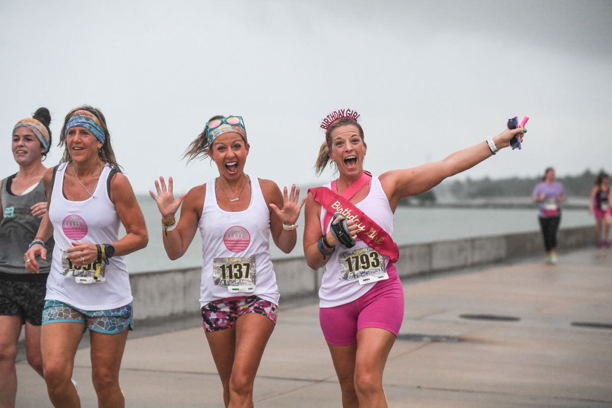 Women running together during retreat fitness activity